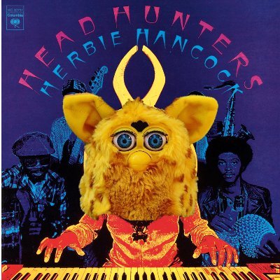 A yellow 1998 Furby overlaid on the Head Hunters (1973) album cover.